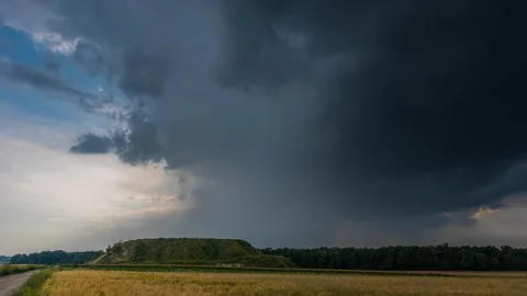 Timelapse showing the close passage of a highly water-loaded storm cell. Stock Footage 301449906