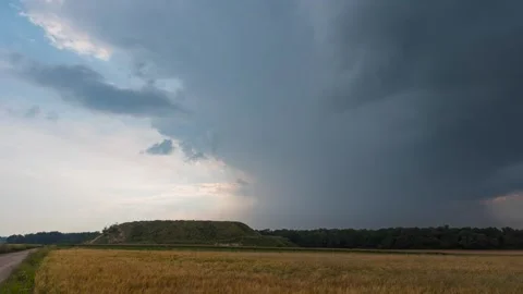Timelapse showing a close passing storm cloud with heavy rainfall. Stock Footage 301432530