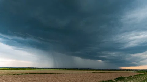 Timelapse showing heavy rainfall from a storm cloud Stock Footage 301410246
