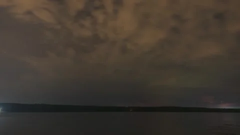 Timelapse showing the movement of a nighttime thunderstorm Stock Footage 301428042