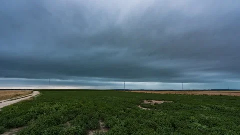 Timelapse showing a passing thunderstorm cloud Stock Footage 301428374
