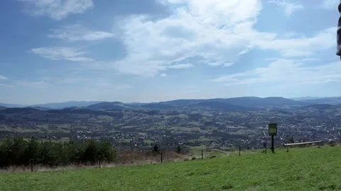 TImelapse showing wide angle of mountain cityscape of Limanowa town Stock Footage 153717930