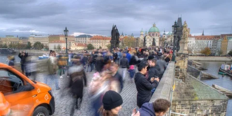 Timelapse of sightseeing tourists passing through the Charles Bridge Prague Stock-Footage 126109091