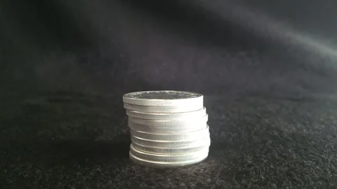 Timelapse - Silver Britannia coins increasing in number Stock Footage 245014685