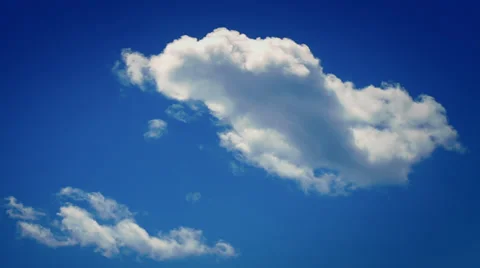 Timelapse of a single Cloud in the blu sky Stock Footage 33697275