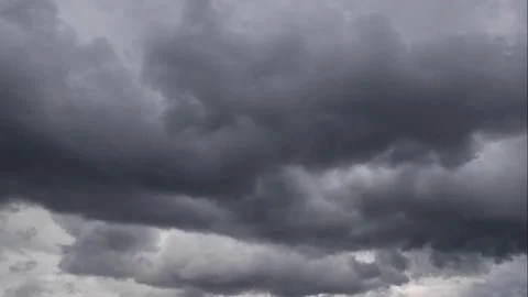 Timelapse sky and black cloud. Dark grey storm clouds. Dramatic sky. Lighting in Stock Footage 140203514