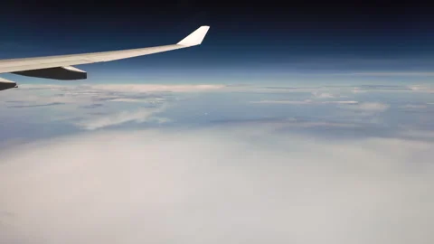 Timelapse of sky and clouds from airplane window Stock Footage 309119521