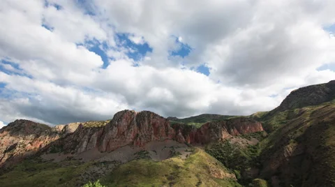 Timelapse of the sky and  gorgeous red rocks in Noravank Monastery, Armenia Video stock 65209970