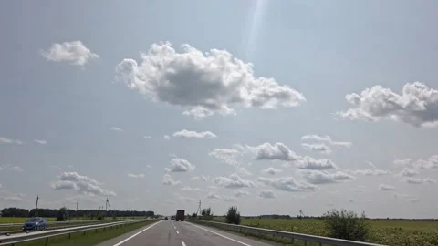 Timelapse sky clouds sunny azure  Ukraine clouds over road hyperlapse Stock Footage 209154062
