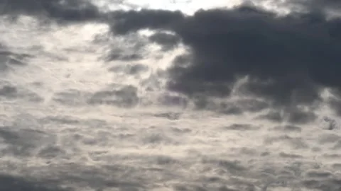 Timelapse with the sky with a flying plane Stockbeeldmateriaal 244129433