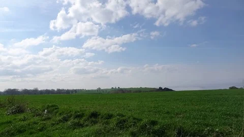 Timelapse sky with green field Video stock 76911383