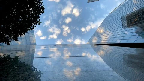 Timelapse sky reflects on mirror tower Stock Footage 245846635