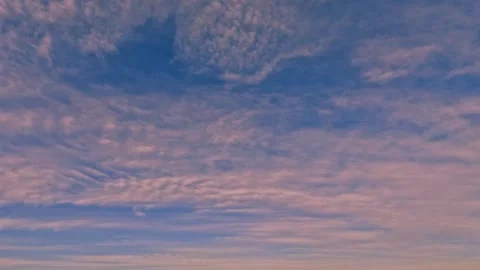 Timelapse of the sky of small clouds at sundown after the rain for forecast Video stock 245753159