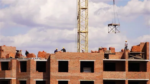 Timelapse of skyscraper construction creation by workers with crane Stock Footage 25058793