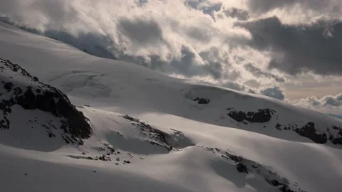 The timelapse slope is the southern spruce movement of clouds with wind and snow Stock Footage 136106930