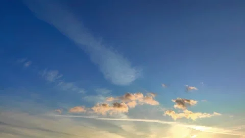 Timelapse small cloud melting blue sky at sunset in evening. panorama sunset sky Stock Footage 302940269