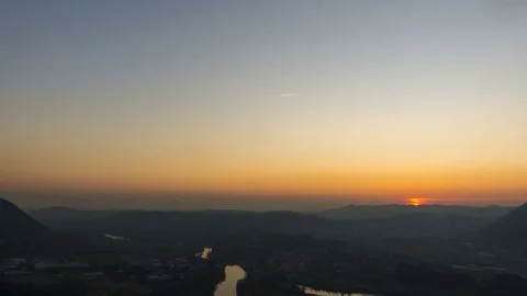 Timelapse of a Small Town by ther River in Italy at Sunset Stock Footage 84877889