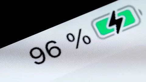 Timelapse - smartphone battery level indicator charging process - close up macro Stock Footage 168911016