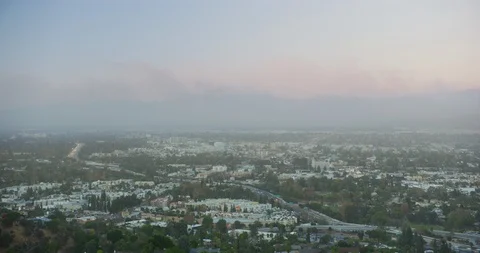 Timelapse of smoke from a forest fire in the hills of Los Angeles county, Stock Footage 99147203