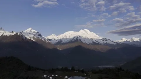 Timelapse of Snow-capped Mount Namcha Barwa and a Tibetan Village in Tibet, 스톡 동영상 336828425