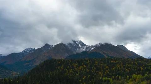 Timelapse snow capped mountain peaks Видео 222826628