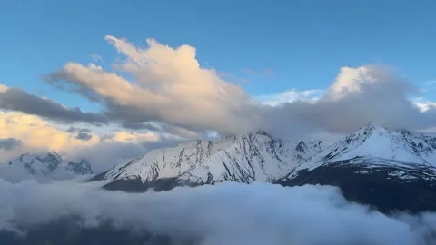 Timelapse: Snow Mountains and Rolling Clouds in Tibet, China Stock Footage 336008328