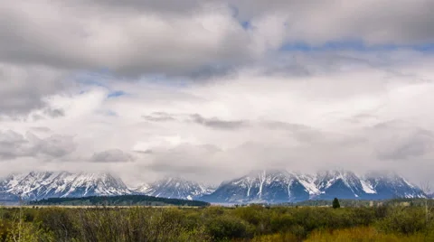 Timelapse of Snow Mountains with Clouds in Grand Teton National Park, USA. Stock Footage 62565480