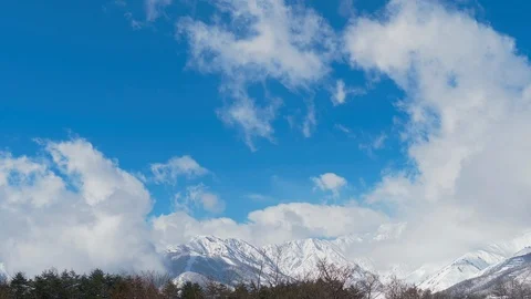 Timelapse of snowy mountains and clouds in Nagano, Japan 스톡 동영상 105654429