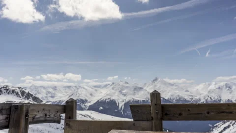 Timelapse - Snowy Mountains and clouds in spring Stock Footage 165684025