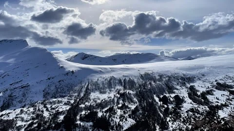 Timelapse of snowy mountains in spring in Norway Stock Footage 309140988