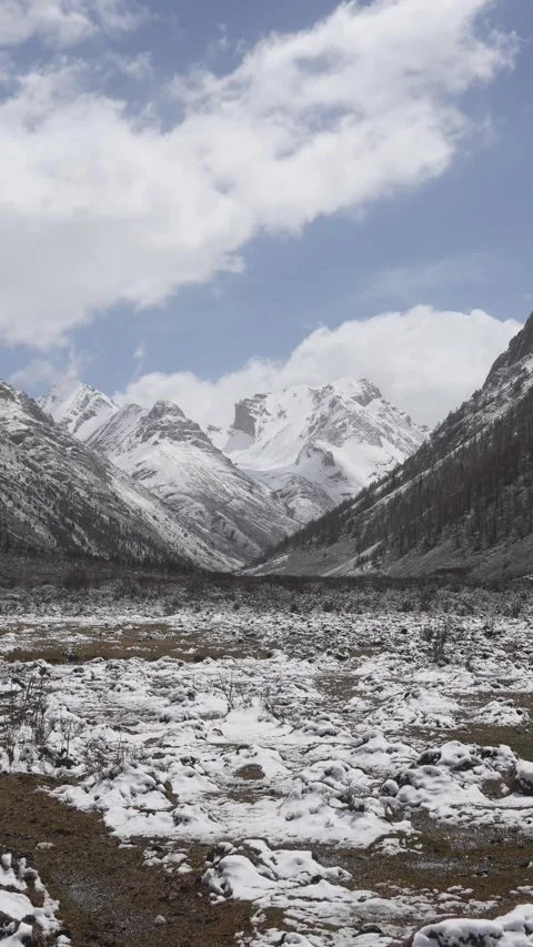 Timelapse of Snowy Valley and Peaks in Qizang Gou, Sichuan Stock Footage 346168037
