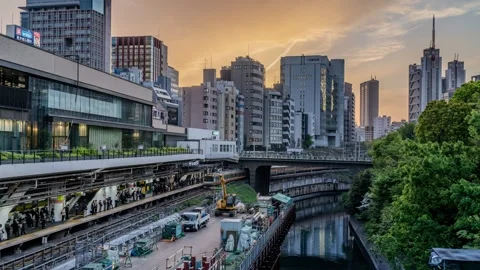 Timelapse of a Soba Line commuters and trains at Ochanomizu Station Stock Footage 338363463