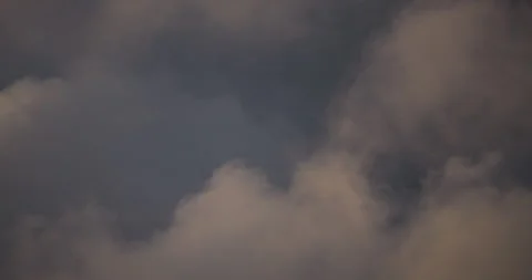 Timelapse of soft clouds moving through dramatic twilight sky with gentle color  Stock Footage 293071718