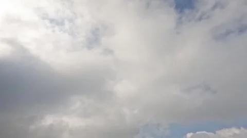 Timelapse of soft white clouds in the sky moving fast Stock Footage 320918194
