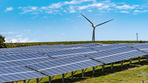 Timelapse of the solar panels and wind turbines for the production energy Stock Footage 154506695