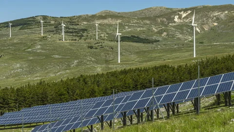 Timelapse of the solar panels and wind turbines for the production energy Stock Footage 154507270