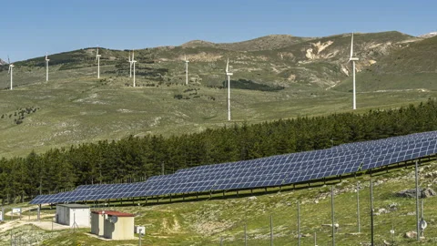 Timelapse of the solar panels and wind turbines for the production energy Stock Footage 154508133