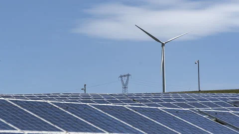 Timelapse of the solar panels and wind turbines for the production energy Stock Footage 154508813