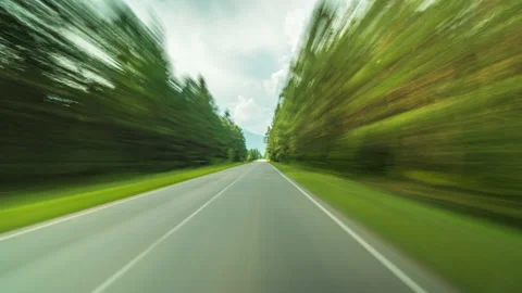 Timelapse of a Speedy Day Drive. View From the Car Windshield to the Country Stock Footage 186981280