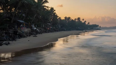 Timelapse of sri lanka beach with cloudy sky at sunset Stock Footage 107898205