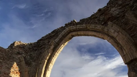 Timelapse of St Benets Abbey gatehouse ruins (pan) Stock Footage 71538018