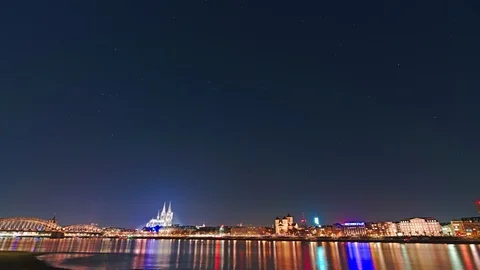 Timelapse of starry night sky at Cologne, Germany 8k Stock Footage 103456138