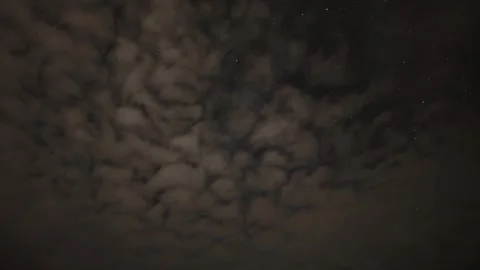 Timelapse of starry night sky full of stars then filling with clouds Stock Footage 341835243