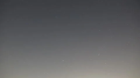 A timelapse of the starry night sky with planes passing by Stock Footage 303307654