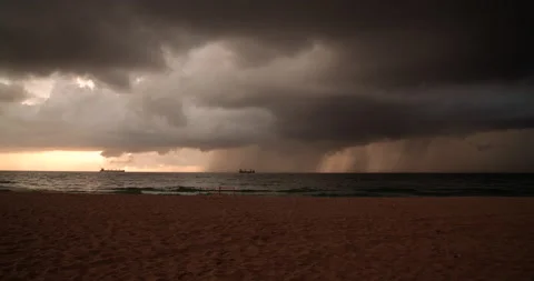 Timelapse of Storm Approaching Shoreline During Beach Sunrise Stock Footage 201736136