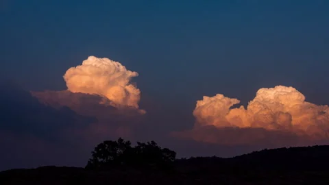 Timelapse - Storm clouds during golden hour 4K30 Stock Footage 271195187