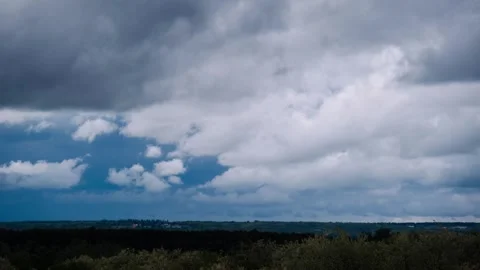 Timelapse of Storm Clouds Moving Over Rural Landscape Stock Footage 310723827