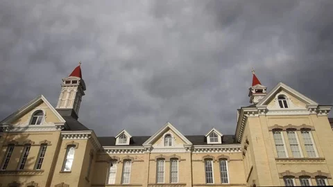 Timelapse of Storm Clouds Over Historic Mental Hospital Stock Footage 90225116
