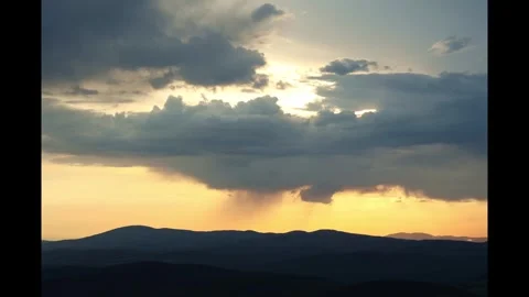 Timelapse of storm clouds over landscape 스톡 동영상 274711332