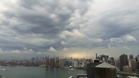 Timelapse-Storm Clouds over Lower Manhattan with boats Stock Footage 69912362